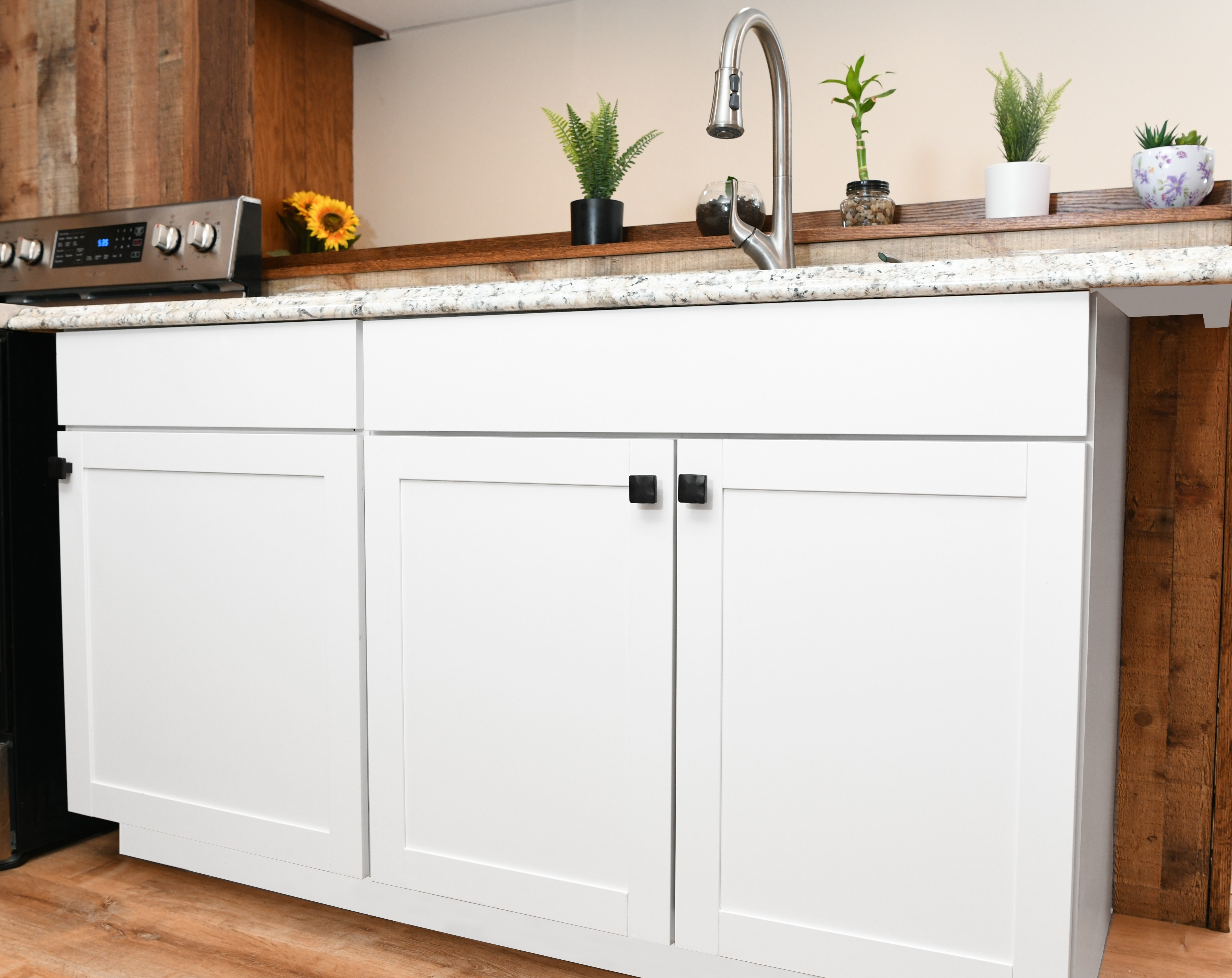 Stonecut knobs in modern kitchen setting